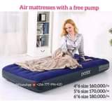 A picture of Air mattresses and sleeping bags