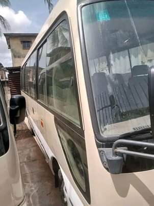A picture of Toyota coaster bus...3RZ engine...year 2015...AC working perfectly... price 24m DM