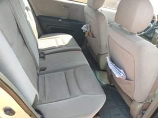 A picture of Toyota Highlander in perfect condition buy and drive engine and