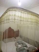 A picture of Two Stand Mosquito Nets