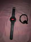 A picture of Amazfit T rex Pro Blue Original with the charger also