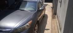 A picture of Honda accord 2009 Ac Gear Engine is tapping nothing else