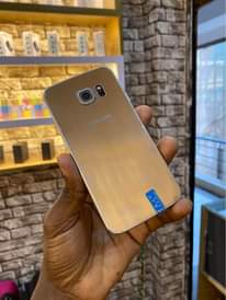 A picture of SAMSUNG S6EDGE 32GB AT UGSHS 220 000CLEAN MASAVU WATSP CAL