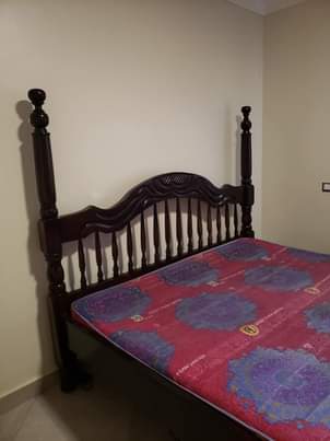 A picture of 6 6 bed and matress and sofa chair