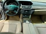 A picture of Belgium Standard 2011 Mercedes Benz E350 4MATIC white 1st body