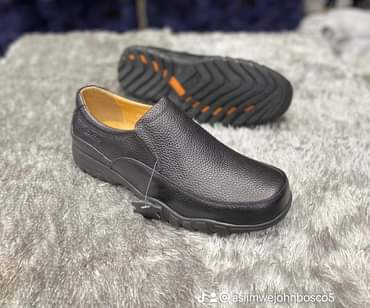 A picture of Great men s shoe s whatsapp 256704920917