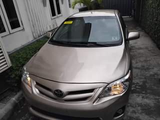 A picture of Few months registered Toyota Corolla 2013 pure first body Tokunbo