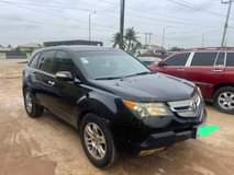 A picture of This is super clean Acura MDX 2009 model first body