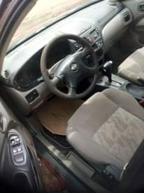 A picture of Nigeria Used Nissan Almera Automatic working fine engine gear AC