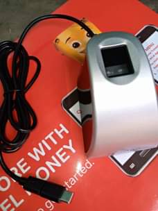A picture of Machine and phone that registers replacement and verifies lines 0701645723