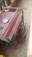 A picture of LG washing machine and Honda 3kva generator