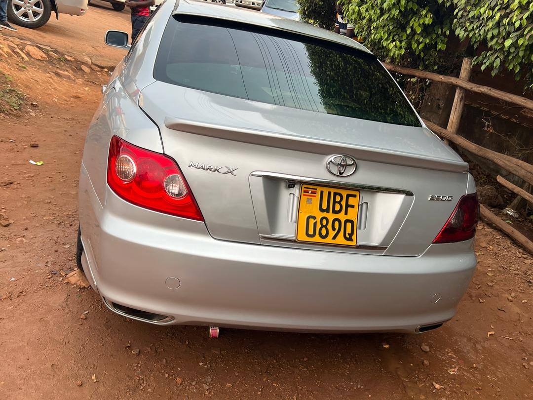 A picture of Toyota mark x and subaru gc8