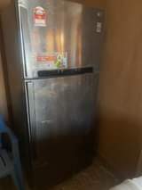 A picture of LG Inverter refrigerator 55 inch Samsung smart and app tv