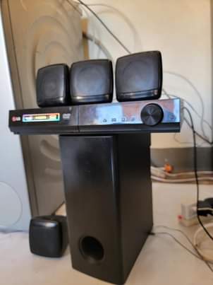 A picture of LG hometheater and vyom tv 24 inches digital