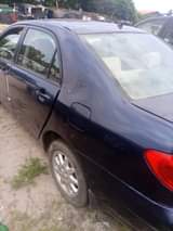 A picture of 2004 COROLLA painted on first body engine and gear AC