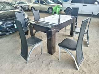 A picture of Near dining table set with 6 pairs of chair.