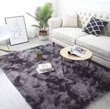 A picture of  RESTOCKED Fluffy bedside carpets now available in different colors