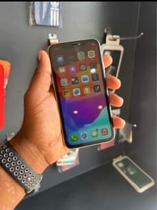 A picture of iPhone 11 plain Storage 128 No face Price 630k Location