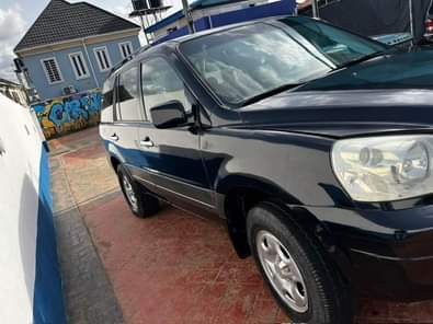 A picture of Sharp deal 2006 Honda pilot Sharp like toks Sound engine