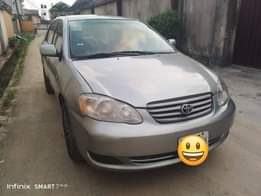 A picture of DEALER S Market Toyota Corolla 2004 Engine has little top