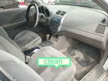 A picture of V6 Nissan altima white