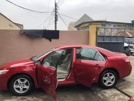 A picture of Fresh And Clean Toyota Camry LE On Ground Now For