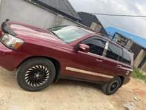 A picture of 2004 Toyota Highlander Super clean Buy and drive Price 3M