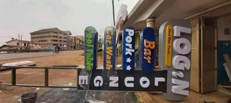 A picture of 3D signpost and branding