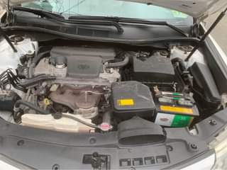 A picture of Toyota Camry 2014 White on Grey Interior