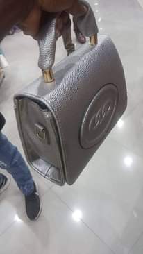 A picture of Bags clutches and back pack