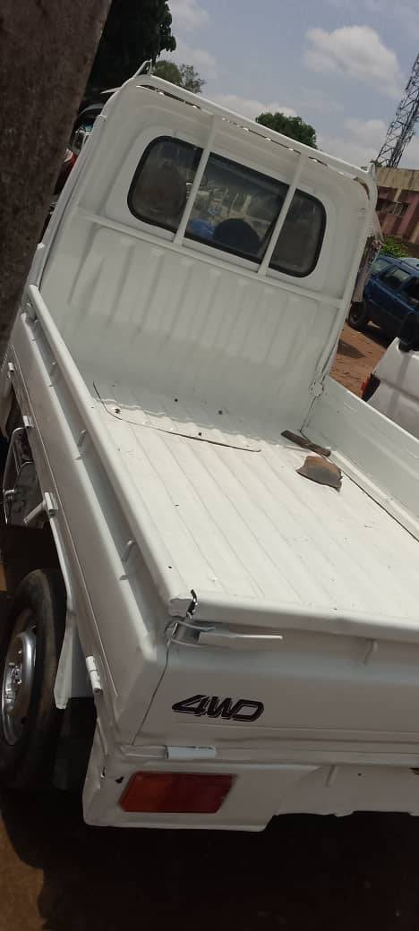 A picture of Daihatsu Hijet mini pickup.