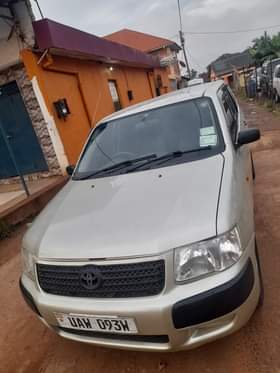 A picture of Make TOYOTA Brand SUCCEED Year 2004 Color SLIVER GOLD Grade
