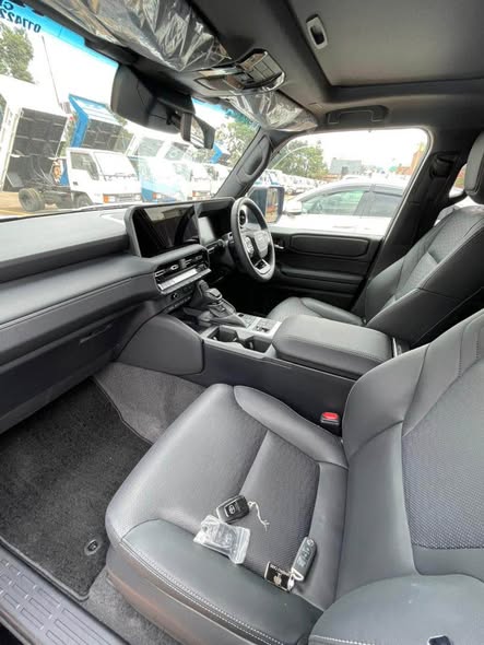 A picture of LAND CRUSIER PRADO 2024 MODEL PETROL ZERO MILEAGE BLACK INTERIOR