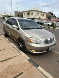 A picture of QUICK SALE EXTREMELY CLEAN USED TOYOTA COROLLA LE 2004 MODEL