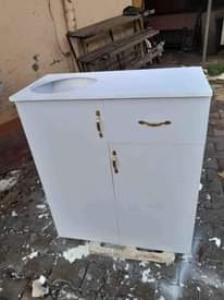 A picture of Kitchen cabinet which can hold a 6kg gas cylinder