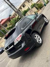 A picture of NEWLY ARRIVED FOREIGN USED 2010 RX350 CLEAN TITLE WIT REVERSE