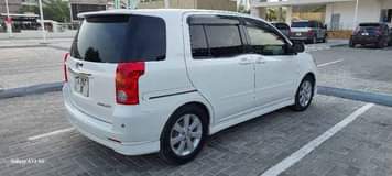 A picture of White Toyota Raum For Sale