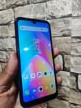 A picture of infinix smart HD 32gbs 2gb ram finger print 300 000