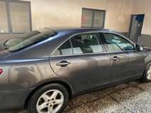 A picture of AWOOF OO FASTEST FINGER Sweet 2008 Toyota Camry LE Supper