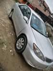 A picture of Toyota Camry 2004 4 plug Painted on first body Clean