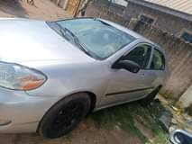 A picture of Distress Corolla wit untempered engine direct owner 08021406874