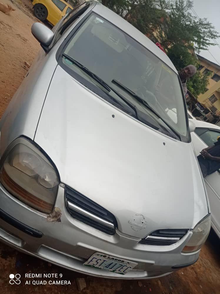 A picture of Nissan Tino Almera in a very good condition AC needs