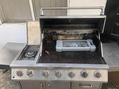 A picture of Foreign Used Ducane stainless steel grill