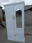 A picture of Show case nipe 100 kitanda 5 6 cheupe mninga mbao