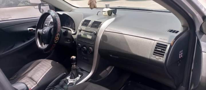 A picture of 010 Toyota Corolla brought brand new working perfectly fine manual