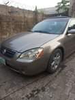 A picture of Nissan altima available for sale Price 900k Everything working perfect