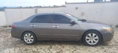 A picture of 2006 registered Honda accord discussion continue DC engine gear and