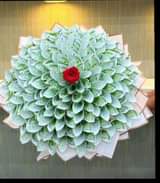 A picture of Bouquets and money towers