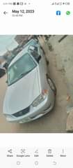 A picture of Toyota Corolla year 2002 engine and transmission and ac is