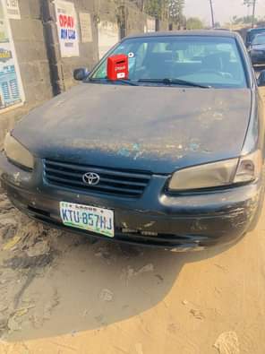 A picture of Toyota Camry tiny light Engine ok Gear ok Body needs